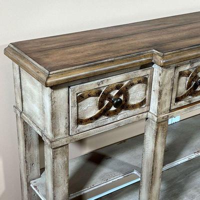 HOOKER FURNITURE CONSOLE TABLE  |
Metallic scrollwork design on a rustic distressed painted wood frame, three drawers over two open...