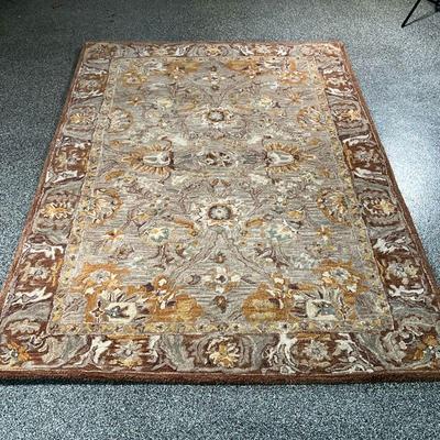 SAFAVIEH WOOL CARPET  |
Grey-brown wool carpet from the Anatolia collection, with an overall pattern - l. 5 x w. 8 ft.
