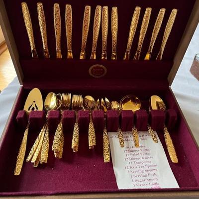 set of gold toned flatware, for 12
