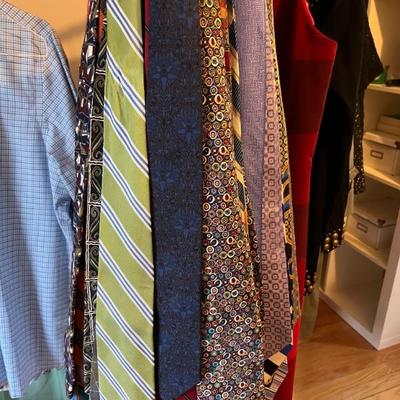 lots of ties, used clothes, shoes, belts, hats, handbags