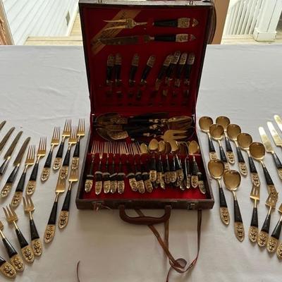 Set of bronze flatware with wood handles from Thailand, mid century, 16 place settings