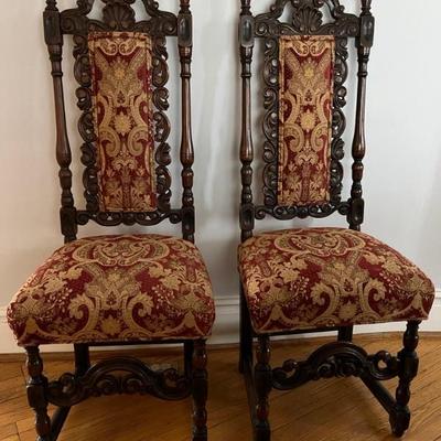 Pair of 1920s Spanish Revival chairs with elaborate carving, 47”h 19”w x 16”d 22”sh