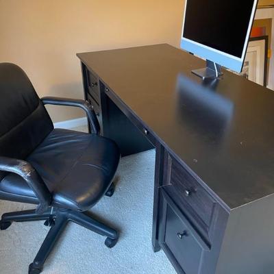 Black office desk and chair