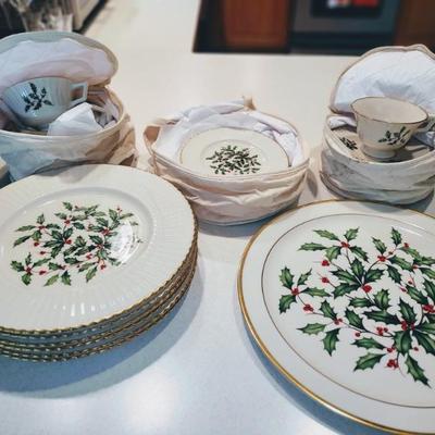 Lenox Christmas dinner set with cups, saucers, dessert and dinner plates.