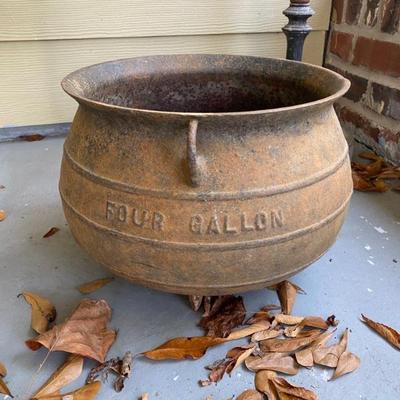 4 gallon cast iron wash pot used for planter