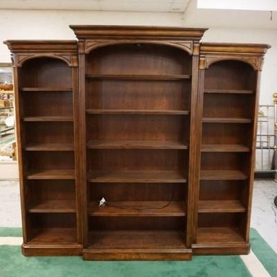 1239	3 PART WALL UNIT WITH ADJUSTABLE SHELVES AND INTERIOR LIGHTS, CHERRY FINISH. APPROXIMATELY 93 IN X 17 IN X 83 IN H

