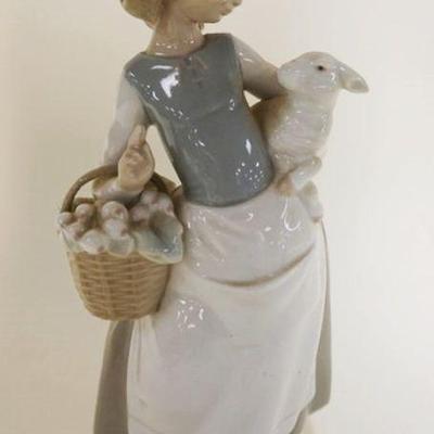 1055	LLADRO GIRL HOLDING LAMB, APPROXIMATELY 10 IN HIGH
