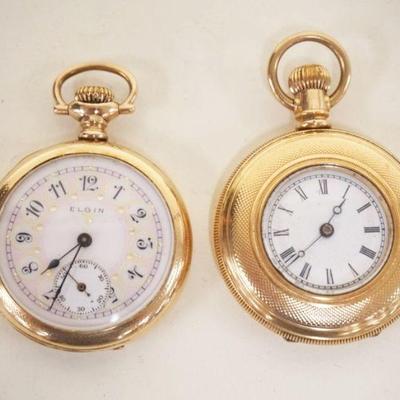 1079	2 ELGIN SMALL APPROXIMATELY 1 1/4 IN POCKET WATCHES IN GOLD FILLED CASES, AS FOUND
