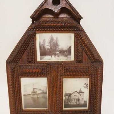 1104	ANTIQUE TRAMP ART FRAME IN THE SHAPE OF A HOUSE W/3 PHOTOS, APPROXIMATELY 12 IN X 16 1/2 IN HIGH
