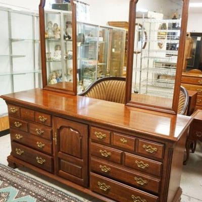 1249	THOMASVILLE TRIPLE DRESSER WITH MIRRORS AND STOP CHAMFORD REEDED SIDES, APPROXIMATELY 72 IN X 20 IN X 80 IN H
