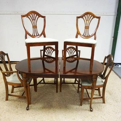 1256	MAHOGANY DINING TABLE AND 6 SHIELD BACK CHAIRS, TABLE APPROXIMATELY 64 IN X 42 IN X 29 IN
