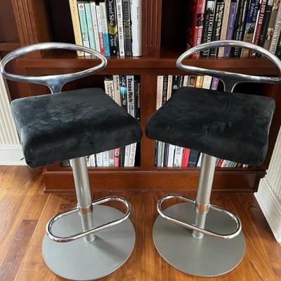 chic pair of modern barstools, steel with black suede seats