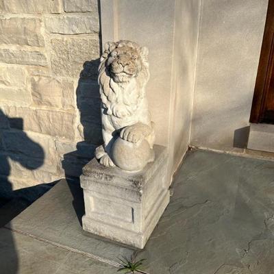 pair of concrete garden statues, lions