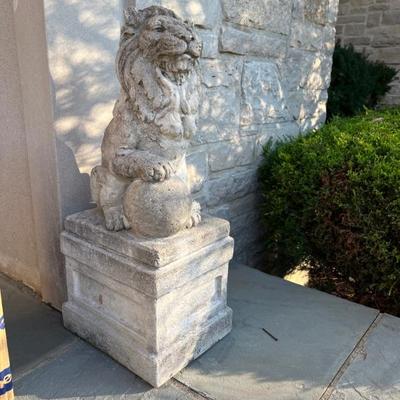 pair of concrete garden statues, lions