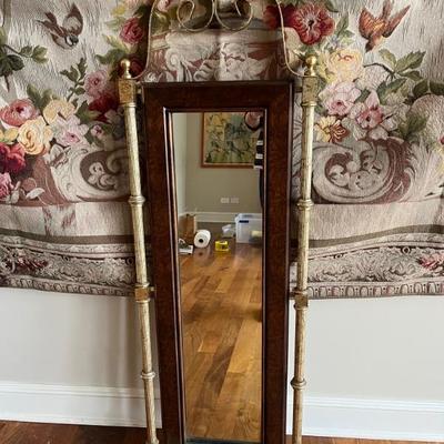 cool 1970s Hollywood Regency black and gold mirror