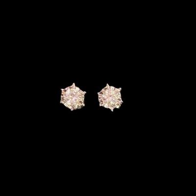 Pair Of .20 Carat Diamond Solitaires In 14 Karat White Gold Surround Setting