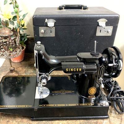 Antique Singer Featherweight sewing machine with case