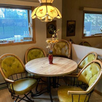 Table and chairs. Pre pro Knapstein sign.  