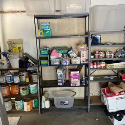 all shelving in garage are for sale including misc. food items, gardening things, cleaning supplies and tools...