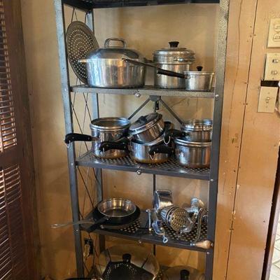 Stainless steel pots and pans some with copper bottoms by Flintware and Revereware and an aluminum Wagnerware roasting pan