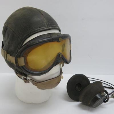 flight cap, goggles and head phones