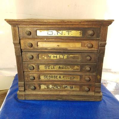 Very old cabinet of drawers (from newspaper)?