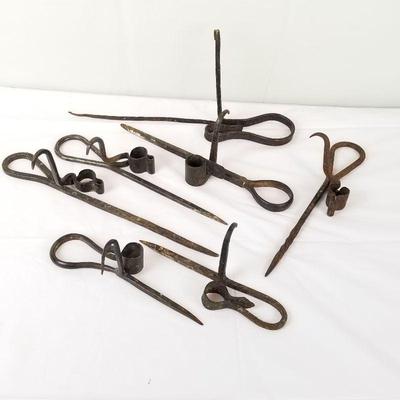 1800s miner's tools (candle holders) sticking Tommies