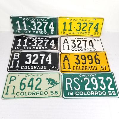 Vintage license plates including rare 1959 Skier plate