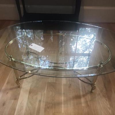 Glass and brass coffee table $450
47 X 30 X 16