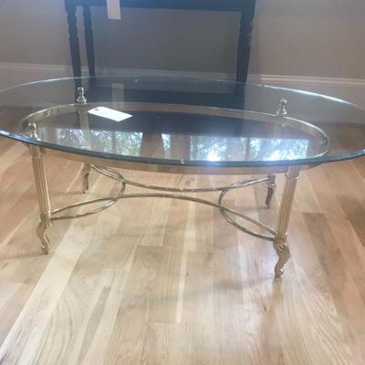 Glass and brass coffee table $450
47 X 30 X 16