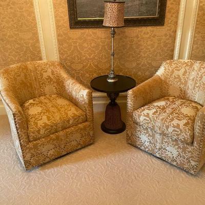 Beautifully upholstered swivel club chairs
