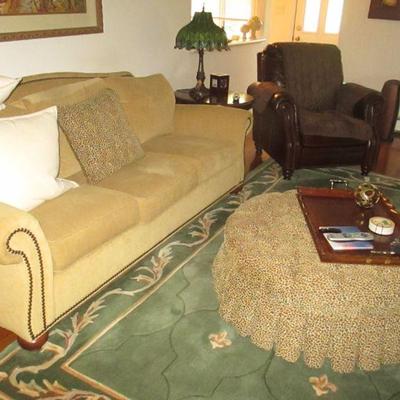 Living Room Suite ~ Entertainment Center~ Rolling Ottoman ~ Rugs ~ Sofa ~ Wall Art  