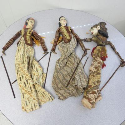 Three hand-crafted stick puppets from Indonesia