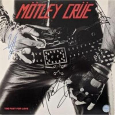 Motley Crue signed album