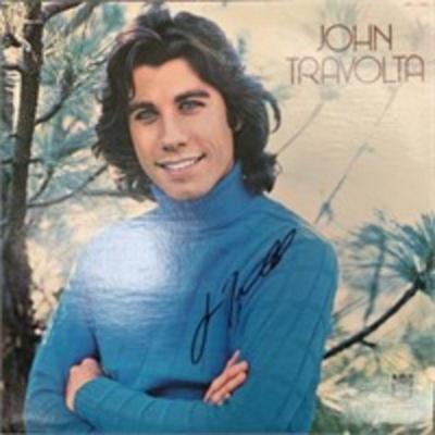 John Travolta signed album