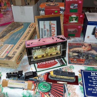 Lionel train merchandise and another Lionel train set in its original box.
