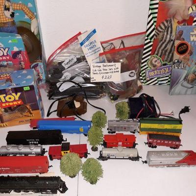 Bachmann and Life-Like train set with tracks, controls and accessories.