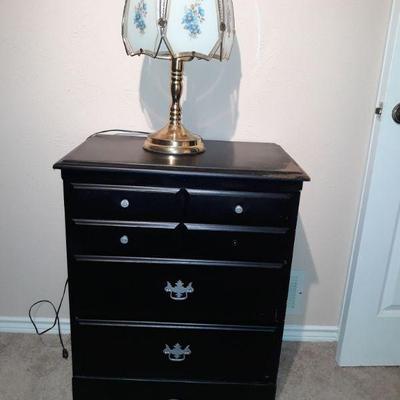 small chest of drawers and lamp