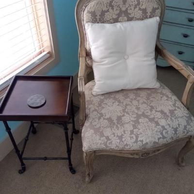 Queen Anne style upholstered chair
Small end table