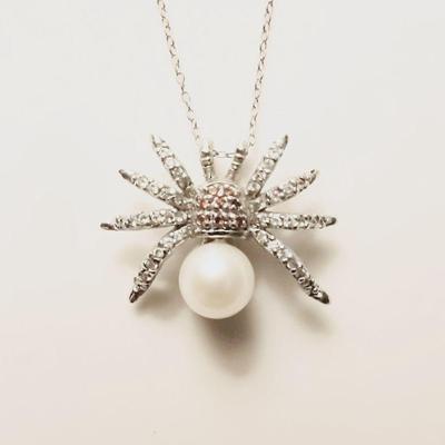 Sterling and pearl spider 