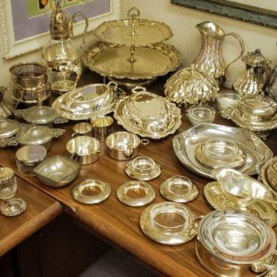 Tons of silver plate & pewter service pieces.