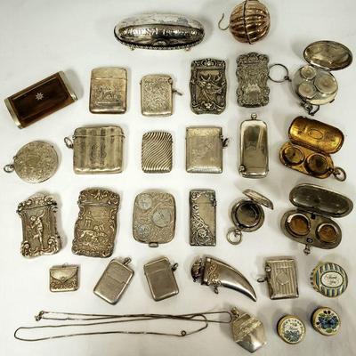 Antique sterling silver match safes, perfume bottles, snuff bottles, coin holders, trinket boxes & more.
