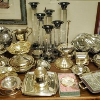 Tons of silver plate & pewter service pieces.