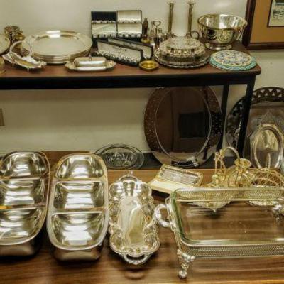 Tons of silver plate & pewter service pieces.