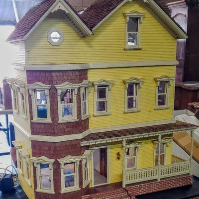 Large handmade wooden dollhouse with furniture & accessories.
