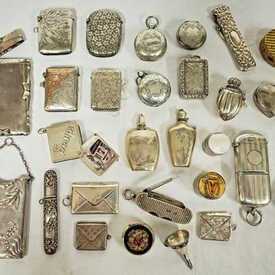 Antique sterling silver match safes, perfume bottles, snuff bottles, coin holders, trinket boxes & more.