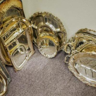 Tons of silver plate & pewter service pieces.