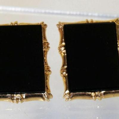 1007	PAIR OF 14K YELLOW GOLD CLIP ON EARRINGS W/ GENUINE BLACK ONYX. TOTAL WEIGHT INCLUDING STONES 6.50 DWT
