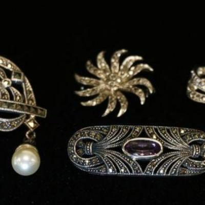 1009	GROUP OF FOUR STERLING SILVER & MARCASITE BROOCH PINES, INCLUDES ONE W/ GENUINE AMETHYST, & ONE WITH DANGLING IMITATION PEARLS....
