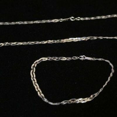 1027	14K WHITE GOLD BRAIDED NECKLACE & BRACELET. COMBINED WEIGHT. 4.50 DWT

